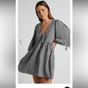 Showpo “ROSITA MINI DRESS - TIE FRONT PUFF SLEEVE DRESS IN BLACK & WHITE CHECK”